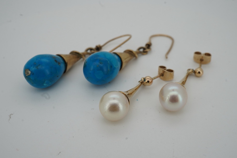 A modern pair of 9ct gold and cultured pearl set drop earrings, 27mm and one other pair of yellow metal drop earrings.